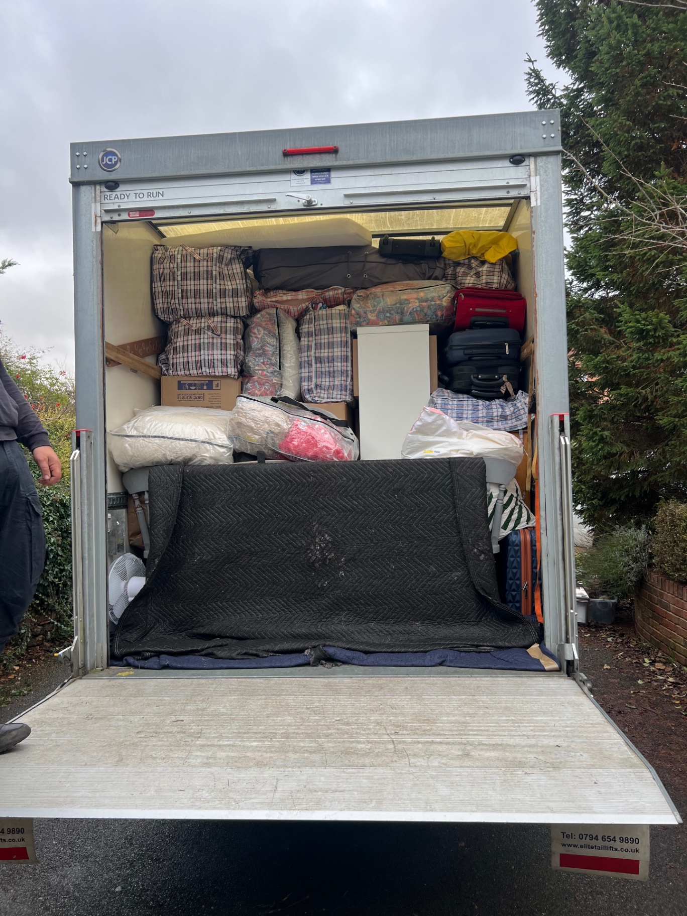 Fully loaded Luton removal van ready for a UK house move
